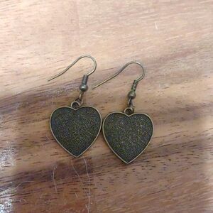 Metal heart-shaped dangle earrings